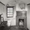 Eilean Donan Castle, interior.
Second floor, dressing room, view of fireplace and window.