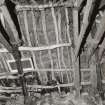 Beaton's Cottage, interior.  View of underside of roof at East side of byre.