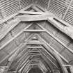 Fernaig cruck-framed barn, interior.
General view of roof beams from South.