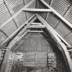 Fernaig cruck-framed barn, interior.
General view of South gable, cruck 1.