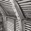 Achmore Farm, Cruck-framed barn, interior.
View of cruck-joint and louvred walls.