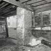 Interior, West section, brick chimney stack, detail