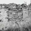 Interior, detail of blocked window in S wall of nave