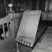 Interior. Laird's loft, detail of hinged pew