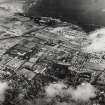RAF WWII oblique aerial photograph of Edinburgh, North West taken from the SE.  Visible are the Royal Botanic Gardens, Fettes College, part of the New Town, the Colonies and the districts of Pilton and Granton.
Print in record