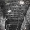 Gasworks, interior.
View of roof construction and pulley-beams of main gasometer house.