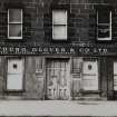 Edinburgh, 10 Bernard Street.
View of shop front with sign reading, 'Young, Glover and Co. Ltd.'