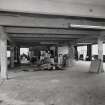 Interior view of the second floor of the main block of C&J Brown's warehouse seen from the East.