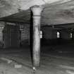Whisky Bond, interior.
Detail of cast iron and transverse jack-arches, flagstone floor, floor 2, North end of warehouse, no.3.