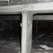 Whisky Bond, interior.
Detail of edge cast-iron roof tank supported by fabricated steel column and beam, warehouse no.3.