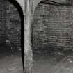 Whisky Bond, interior.
Detail  of column and underside of wooden floor, showing skewed arrangement of building, warehouse no.1, floor 1.