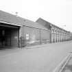 Dundee, Bower Mill: View of main entrance and weaving shed frontage onto Douglas Street from SW