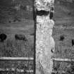 View of sculptured cross, St Columba's graveyard, Canna.