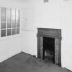 Interior, ground floor view of office showing original fireplace