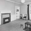Interior, view of first floor South East room from North West showing fireplace