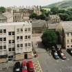 Elevated view of entrance to brewery courtyard from Horse Wynd with Holyrood Palace
