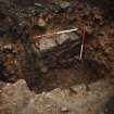 Excavation photograph : area 7, f22, stone lined pit.