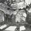 Interior view of the heavily fire-damaged East wing seen from the South.