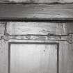 Interior, detail of specimen door-hinges.