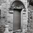 Folly, shell like arch above entrance door, detail