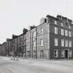 General view from South East of South East end of range and main frontage.