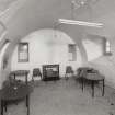 Interior, general view of Ground Floor barrel vaulted room in Old Craig House from West.