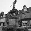 View of statue commemorating the return of Hawick callants from Holnshole in 1514 by W F Beattie (1914) from W