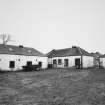 General view across yard from SE.