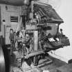 Interior.
View of front of 'Intertype' hot metal typesetting machine.