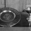 Interior.
Detail of communion plate; brass alms dish and silver baptistry bowl.