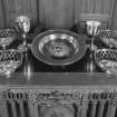 Interior.
Detail of Communion plate; four silver bread baskets, two silver Communion cups and large silver Communion dish.