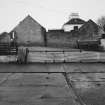 View of byre and outbuildings from N.