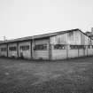 View of outbuilding from NE.