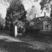 View of lodge and gates from South West