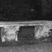 Garden bench resting on two Corinthian capitals, detail