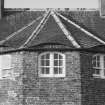Gardener's house, eyebrow dormer surmounting bay window, detail