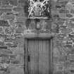 Detail of  painted armorial panel of 'George Gordon Marquis of Huntly and Henriette Stuart Marques of Huntly' on main S building