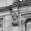 Detail of carved head of a knight corbel