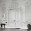 Interior view of the double doorway leading to the sitting room in the drawing room on the first floor.