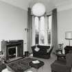 Interior view of the first floor sitting room seen from the North West.