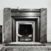 Interior detailed view of the fireplace in the first floor sitting room.