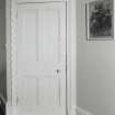 Interior detailed view of a door in the first floor dining room.