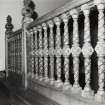 Interior detailed view of the balustrade on the first floor staircase.