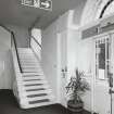 Interior. View of entrance lobby from East showing original stair to galleries
