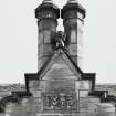 Detail of 1875 datestone and chimneys