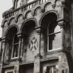 Detailed view of the South facade showing the windows and stonework seen from the South East.