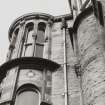 Detailed view of the South facade showing the windows and stonework seen from below from the South.