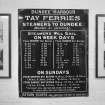 Detail of old enamel sign (on the wall of the ferry terminal offices) providing information on ferry times