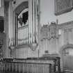 Interior. View of choir stalls and organ