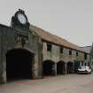 Athelstaneford Mains.
View of N side of steading from NE, including clock, bovine sculpture, and 1860 date plaque.